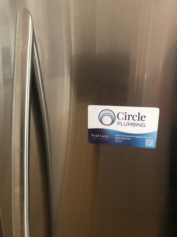 Magnetic Business Card displayed on a Fridge